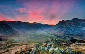 The Langdale Valley at sunset with a pink sky