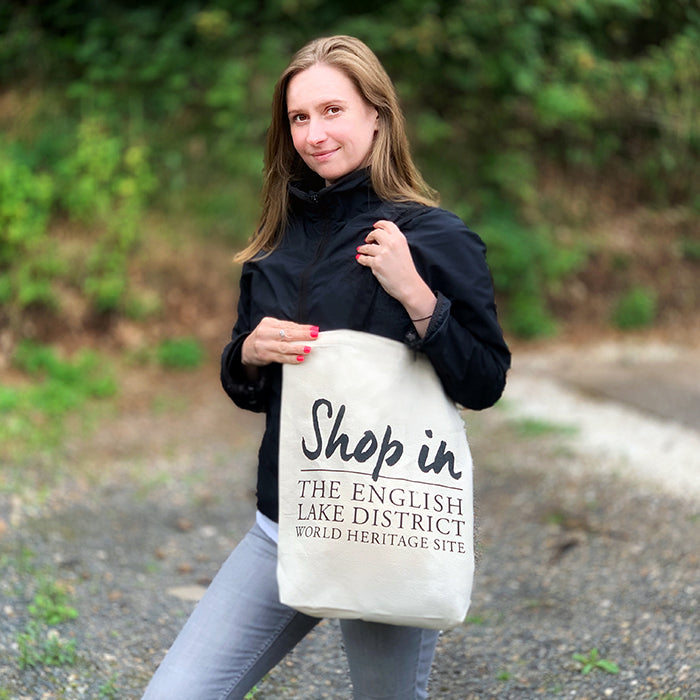 A woman with a Lake District tote bag 