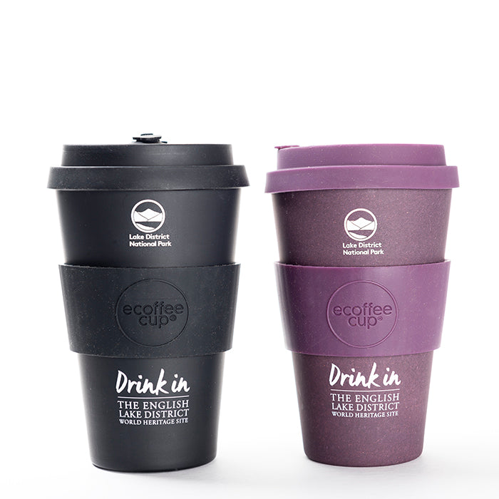 Two lake district shop gifts coffee cups, black and purple 